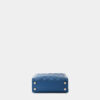 Túi cầm tay màu xanh navy Cleo da thật