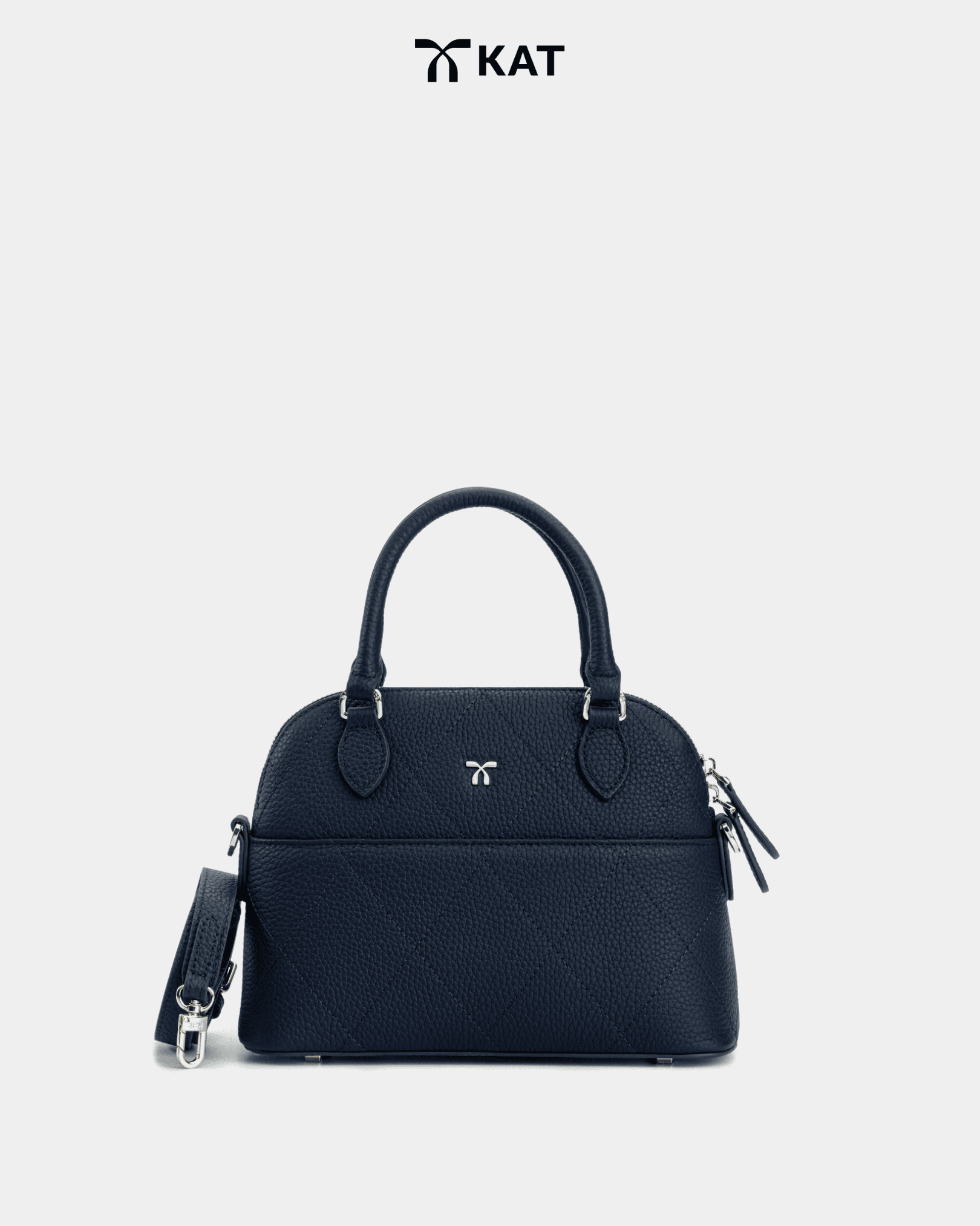 Tui cam tay mau xanh navy Vesper da that