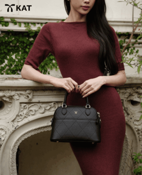 Túi cầm tay màu đen Vesper da thật